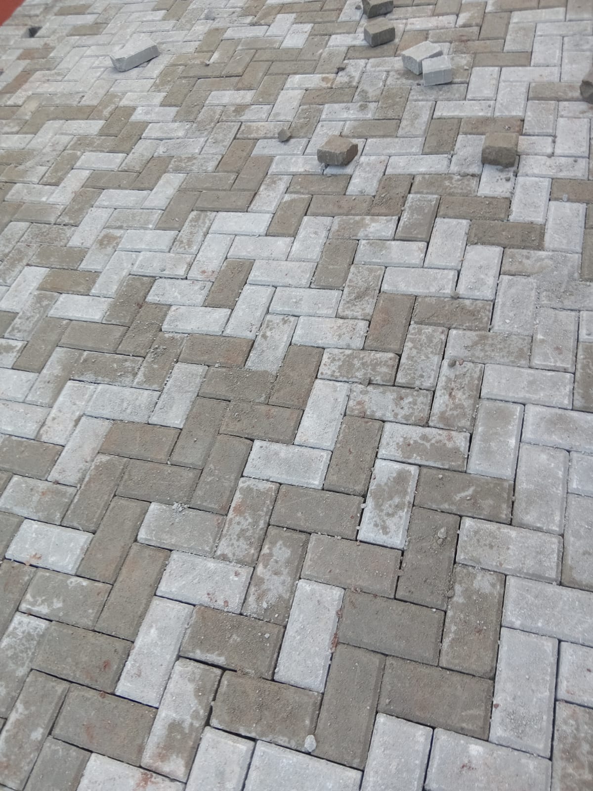 Paving section leveling